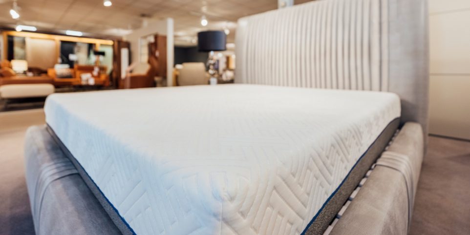 A Soft new mattress in showroom on sale for customers.